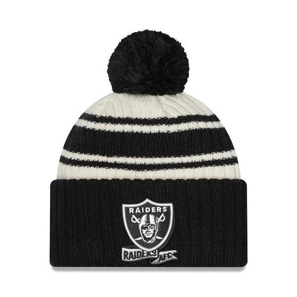 New Era Las Vegas Raiders '22 Sideline Sport Cream Black Cuffed Pom Knit Hat